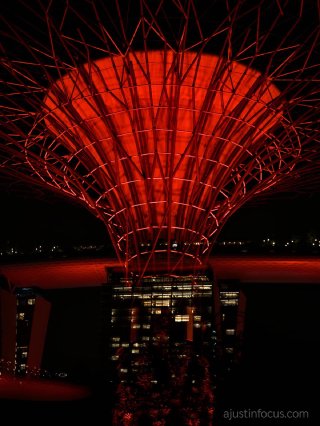 Composite of red 'supertrees' over Marina Bay Sands™